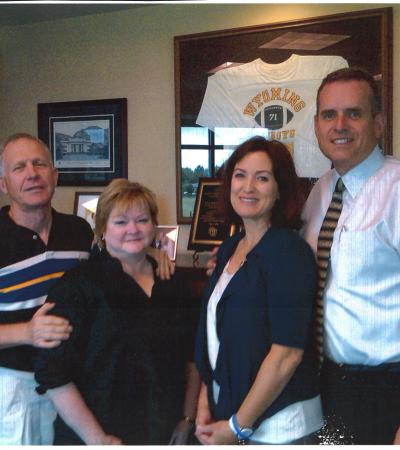 Dennis and Judy Shepard stand with Rulon Stacey and his wife